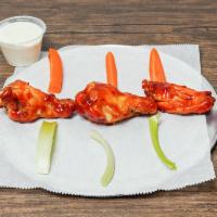 10 Piece BBQ flavor Wings · All natural chicken wings (oven-baked) Comes  with side of Carrots and celery. Your choice o...