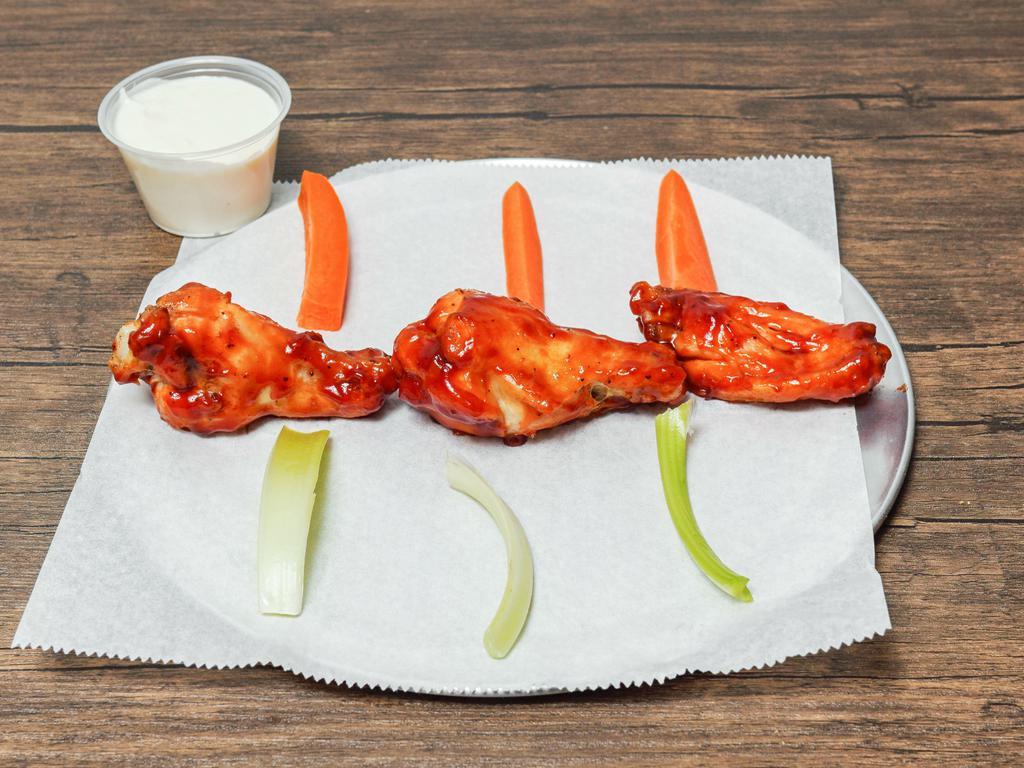 10 Piece BBQ flavor Wings · All natural chicken wings (oven-baked) Comes  with side of Carrots and celery. Your choice of dressing on the side.