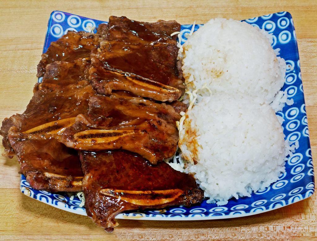 4. Hawaiian BBQ Short Ribs Plate · 4 pieces. Grilled bone-in beef short ribs basted with Aloha BBQ sauce. Served with steamed rice and green salad.