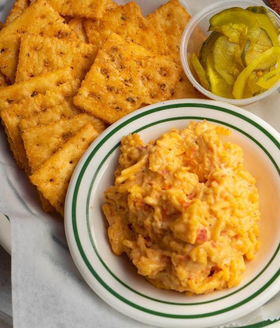 Pimento Cheese Dip · House-made Pimento Cheese served with Spiced Baked Crackers.