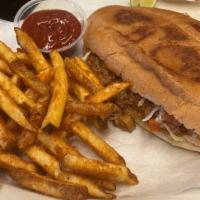Torta with French Fries · Choice of meat. Topped with beans, lettuce, tomato, cheese, and sour cream. Served with seas...