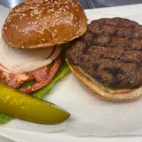 hamburger · 1/2 pound 100% beef with garnish on a seeded bun.