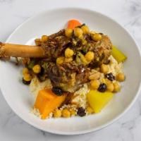 Lamb Shank Couscous · slow-cooked lamb shank, braised butternut squash, carrots, zucchini, celery, turnips, served...