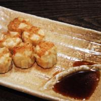 2. Shrimp Shumai · Deep fried with homemade dumpling sauce.