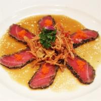 6. APP Pepper Tuna · Sliced tuna with pepper seared with special sauce.