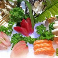 Sashimi Regular · Assorted 15 pieces of sashimi and sushi rice.