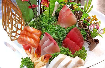 Sashimi Deluxe · Assorted 18 pieces of sashimi and sushi rice.