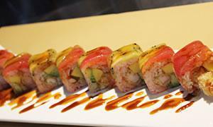 2. Blue Hawaii Roll · Shrimp tempura, avocado and lump crab mango inside tuna kiwi on the top with soy paper.