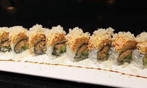 4. Crunch 2 in 1 Roll · Deep fried inside salmon, avocado and spicy sauce, topped with spicy crabmeat and tempura flakes.