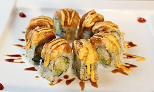 6. Crown Royal Roll · Lobster tempura and asparagus inside with spicy tuna, lobster salad on top, eel sauce and sp...