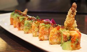 15. Earthquake Roll · Spicy crab, avocado and shrimp tempura inside with rice sheet.