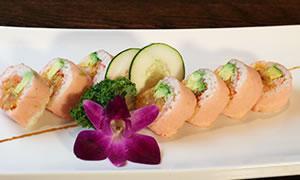23. Pink Lady Roll · Deep fried soft crab, spicy white crunchy tuna and avocado with pink soybean sheet.