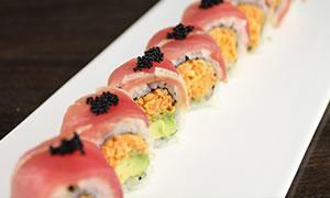 24. Big Daddy Roll · Spicy crunchy crab and avocado inside and pepper tuna black tobiko on the top.