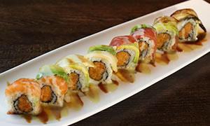28. Special Rainbow Roll · Spicy crunchy salmon inside, tuna, salmon, yellowtail and eel avocado on the top with specia...