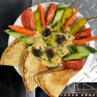 Hummus Plate · Traditional hummus served with veggies and pita.