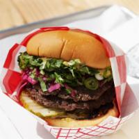 Chop Burger Sandwich · 2 beef patties with charred cabbage, peanut, pickles, cilantro-scallion, mustard and mala gl...