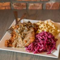 Hahnchenschnitzel · Fried chicken cutlet. Served with choice of 2 sides.