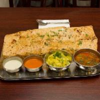 Onion Rava Masala Dosa · Made with butter and desi ghee.