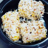 4. Grilled Jerked Corn · oven baked coconut flakes covered over boiled sweet corn (1 whole corn )