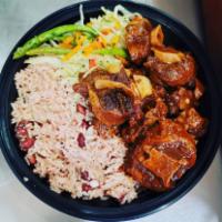 10. Oxtail Stew · Serves with Rice & Peas ,Sweet Mashed potato or Brown Rice 