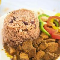 Curry Boneless Chicken  · Served with rice or roti