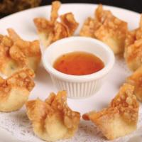 Crab Cheese Fried Wonton · 8 pieces. fried wonton. Served with sweet and sour sauce.