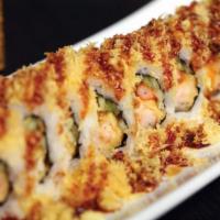 Crunchy A Roll · Shrimp tempura and cucumber, topped with crunchy flakes and eel sauce.
