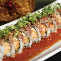New York New York Roll · Shrimp tempura and crab mix, topped with seared fillet mignon and green onion with ponzu sau...