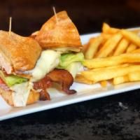 Grilled Chicken Sandwich · Marinated grilled chicken breast, with melted cheddar cheese, bacon, lettuce, tomato, and ro...