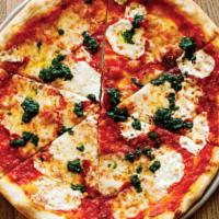 Margherita Pizza · Fresh basil, tomatoes, garlic, fresh mozzarella, sauce, and pizza cheese.