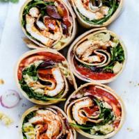 Greek Wrap with Chicken · Lettuce, tomato, onions, cucumbers, feta, olives, and Greek dressing.