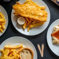 Haddock Dinner · Served with french fries, coleslaw, tartar sauce, and fresh lemon.