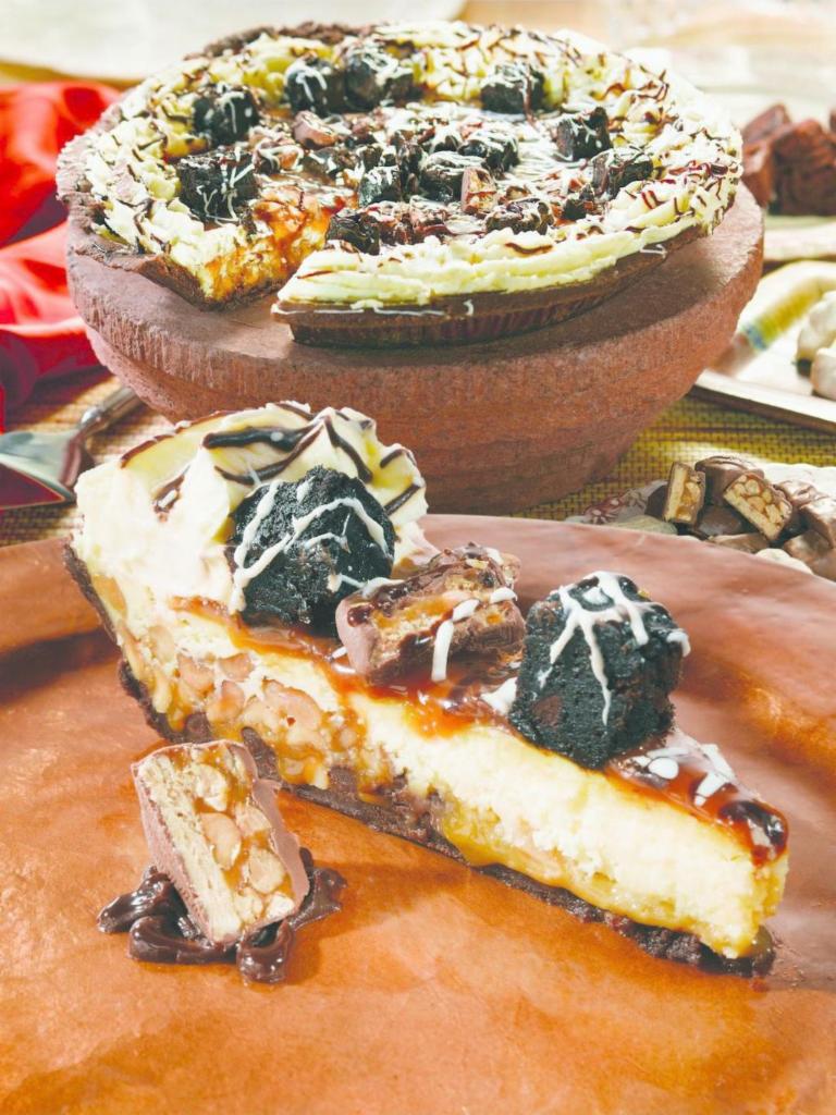 Snickers Grand Slam Pie Cake - NEW!! · Snickers Grand Slam Pie Cake combines the tastes of Snickers Candy with Brownies, Creamy Peanut Buttery and Caramel.