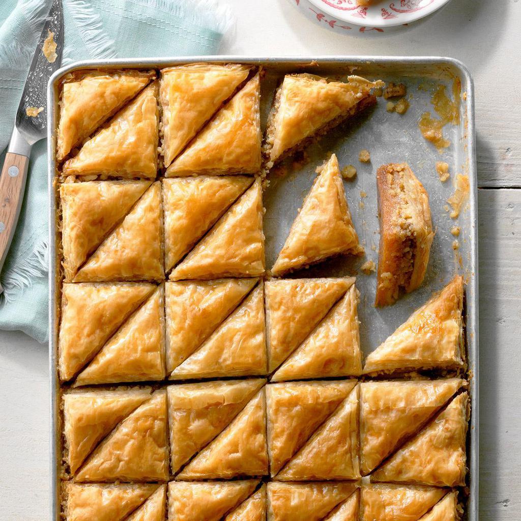 Baklava · A rich, sweet dessert pastry made with layers of filo filled with chopped nuts and sweetened with syrup and honey. 