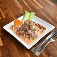 Ceviche Mixto · Peruvian style – sliced fish, shrimp, octopus, squid, and mussels marinated in lime juice, s...