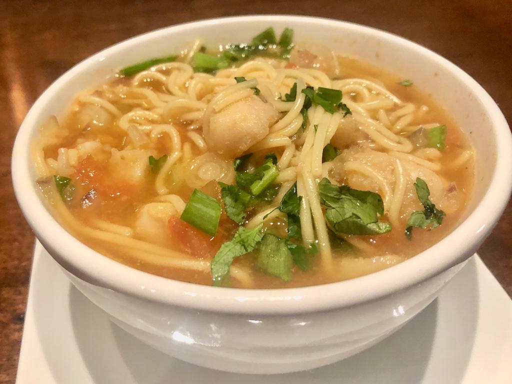 Sopa de Pescado · Fish noodle soup. 