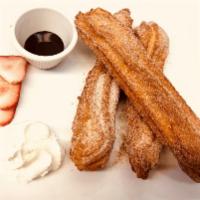 Churros · Fried dough served with a chocolate dip. 