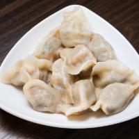P08. Dumplings with Pork and Napa Cabbage白菜猪肉水饺 · 10 pieces.