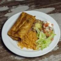 29. Burrito Dinner · 2 burritos, your choice of ground beef or chicken, served with rice and beans.
