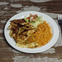 32. Fajita Quesadilla Grande · Choice of style. 1 grande quesadilla served with salad and rice. Grilled vegetables on reque...