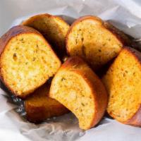 Garlic Bread · Buttery bread that is topped with garlic. 