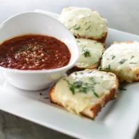 Garlic Cheese Bread · Our delicious garlic bread topped with mozzarella cheese and served with a side of marinara ...