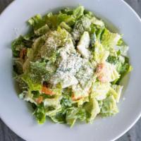 Caesar Salad · Crisp romaine and garlic croutons tossed in a sharp cheese Caesar-style dressing. No anchovi...