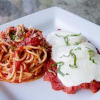Chicken Parmesan · A lightly breaded chicken breast fried then topped and baked with marinara sauce and mozzare...