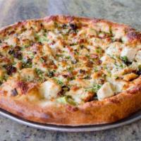 Santa Fe Chicken Pizza · Roasted chicken, red onions, mixed bell peppers, fresh cilantro and spicy Santa Fe cream sau...