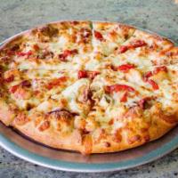 Lobster Seafood Pizza · Roasted red bell peppers and mozzarella cheese topped with lobster, in a brandy cream sauce.