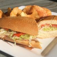 Turkey Sub Sandwich · Sliced turkey breast, provolone cheese, lettuce, tomato, red onions, and mayonnaise.