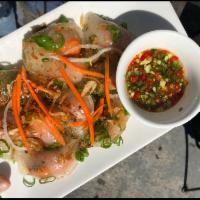 HUE DUMPLINGS - BÁNH BỘT LỌC (GF)	 · Chewy tapioca dumplings, caramelized shrimp, pork belly, fried shallots, served with spicy s...
