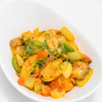 Chicken Mushroom Balti · Chicken with roasted onions, green pepper, mushrooms, herbs, and spices, garnished with cori...