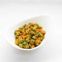 Bhindi Masala · Fresh okra cooked with onion, tomatoes and Indian spices.